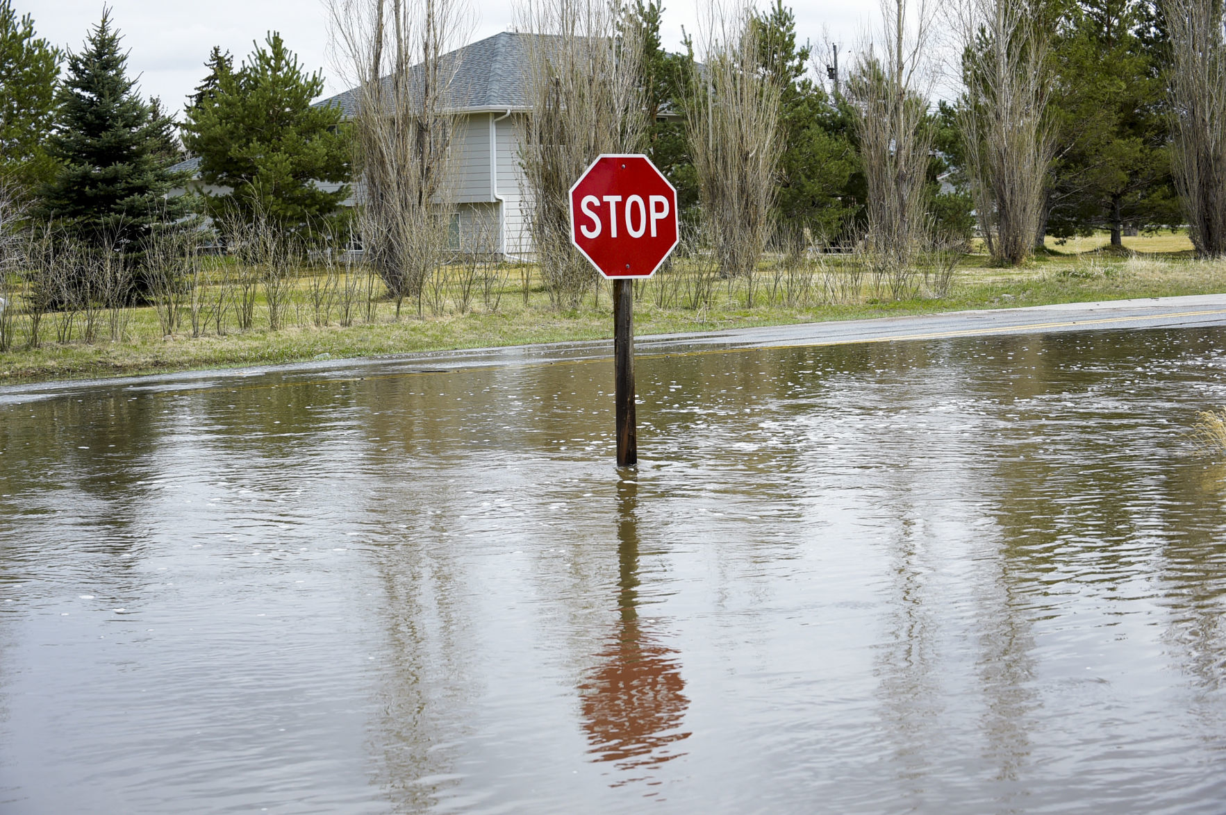 The intersection of Stadler Rd. and McHugh Dr. sits under water